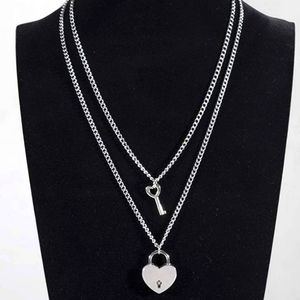 2 necklaces 1 heart padlock AND 1 heart key necklace.  Lock opens